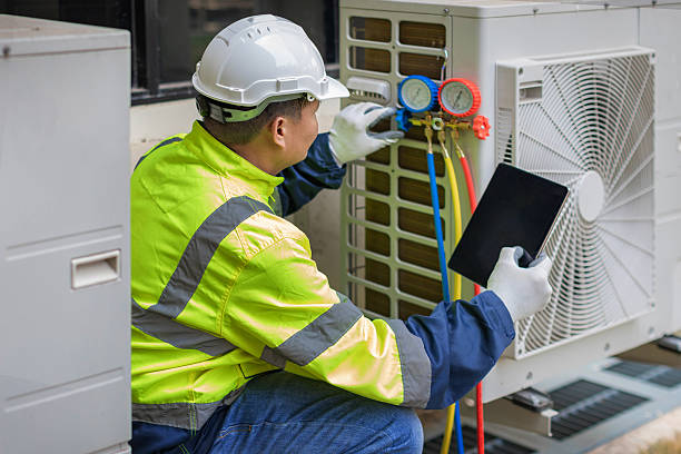Professional Hvac Maintenance technician working in Iowa City, IA